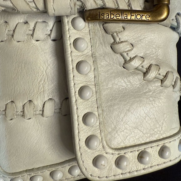 Isabella Fiore Cream Leather Clutch/wristlet with Tassel, Buckle, and studs - Picture 9 of 12